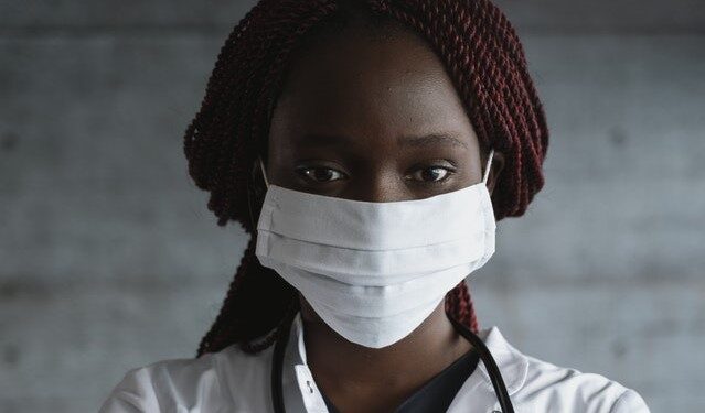 Female doctor in mask Burnout in women physicians